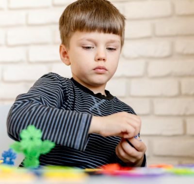 little-kid-playing-indoors-min